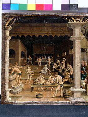 Im Hintergrund links in der Darstellung von Hans Wertinger auf einem Tafelbild von 1516 im Germanischen Nationalmuseum, ist ein ähnlicher Schwitzofen zu sehen, wie der von uns mittlerweile nachgebaute Ofen. Fotoaufnahme eines Details aus einem Tafelbild von Hans Wertinger. Das Gemälde zeigt ein gut besuchtes Badhaus. Links im Hintergrund ist ein Schwitzofen zu sehen, der dem nachgebauten im Freilandmuseum ähnelt.